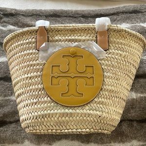 Brand new with tags! Never used. Cosmetic bag included.